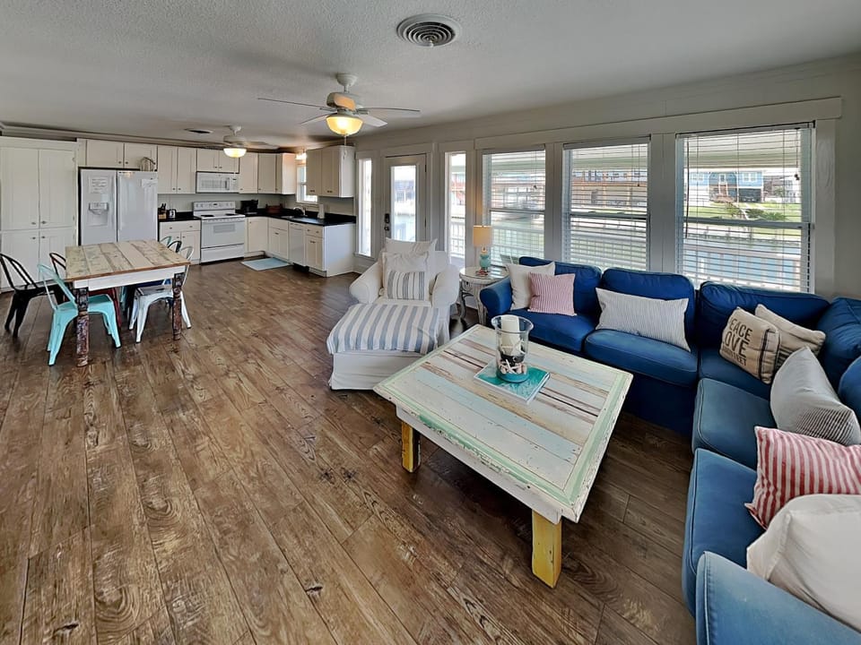 View (from property/room), Kitchen or kitchenette, Living room, Seating area, furniture, microwave, oven, stove, toaster