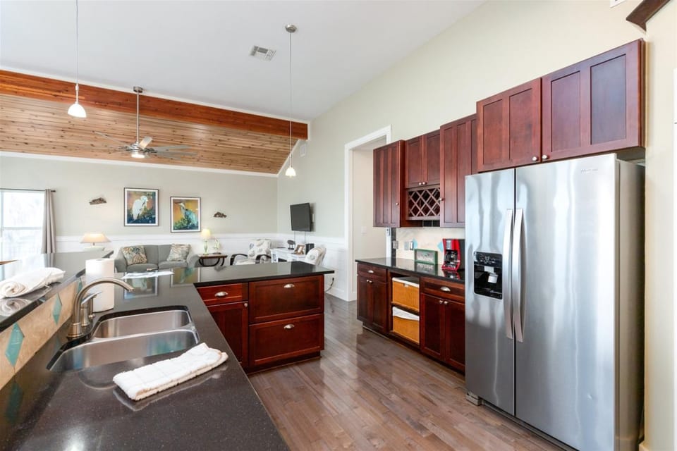 TV and multimedia, Kitchen or kitchenette, Living room, Seating area, dishwasher, furniture, microwave, oven, stove, toaster, kitchen