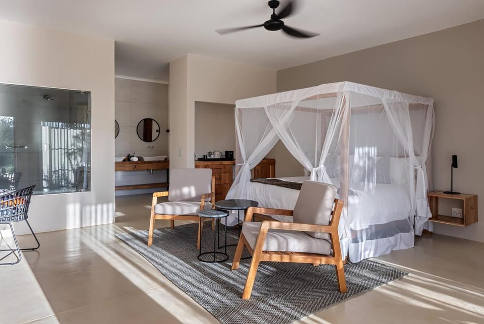 Patio, Bed, Living room, Photo of the whole room, Seating area, Bedroom, fireplace