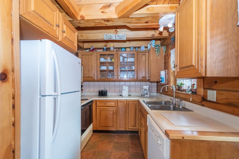 Kitchen or kitchenette, dishwasher, microwave, oven, stove, toaster, kitchen