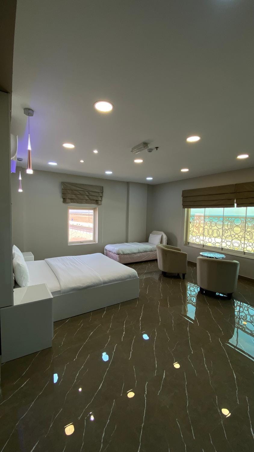 Bed, Seating area, Bedroom