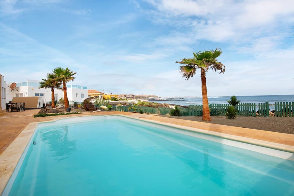 Property building, Living room, Swimming pool