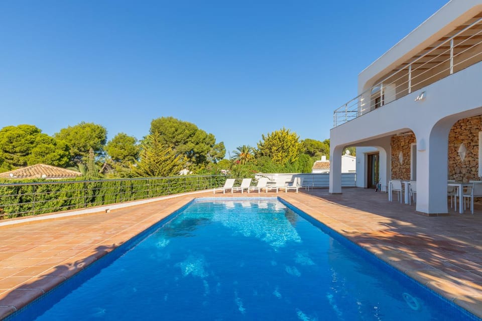 Property building, Living room, Swimming pool
