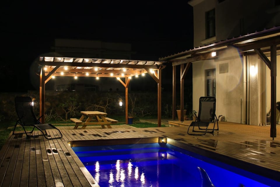 Patio, Night, Beach, Pool view, Swimming pool, sunbed