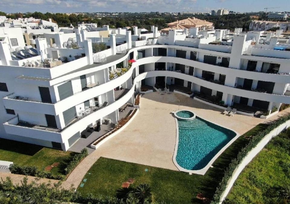 Property building, Patio, Patio, Bird's eye view, View (from property/room), Balcony/Terrace, Balcony/Terrace, City view, Swimming pool, Location