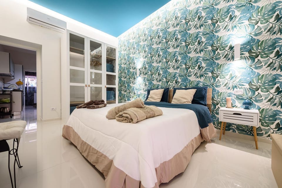 Bed, towels, towels, wardrobe