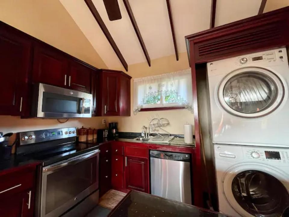 Kitchen or kitchenette, dishwasher, oven, stove, washing machine, dryer