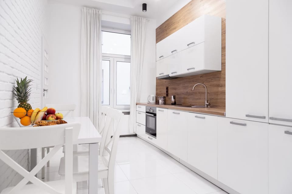 Kitchen or kitchenette, dishwasher, oven, stove