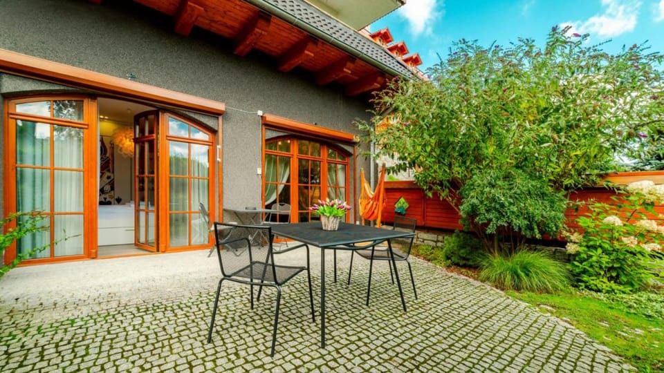 Property building, Patio, Spring, Day, Garden, View (from property/room), Balcony/Terrace, Garden view