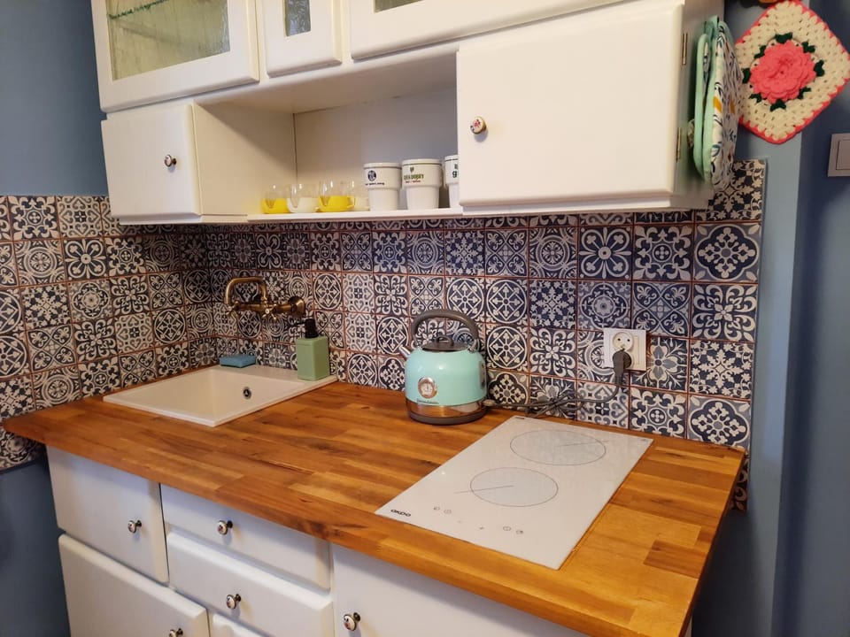 Kitchen or kitchenette, stove