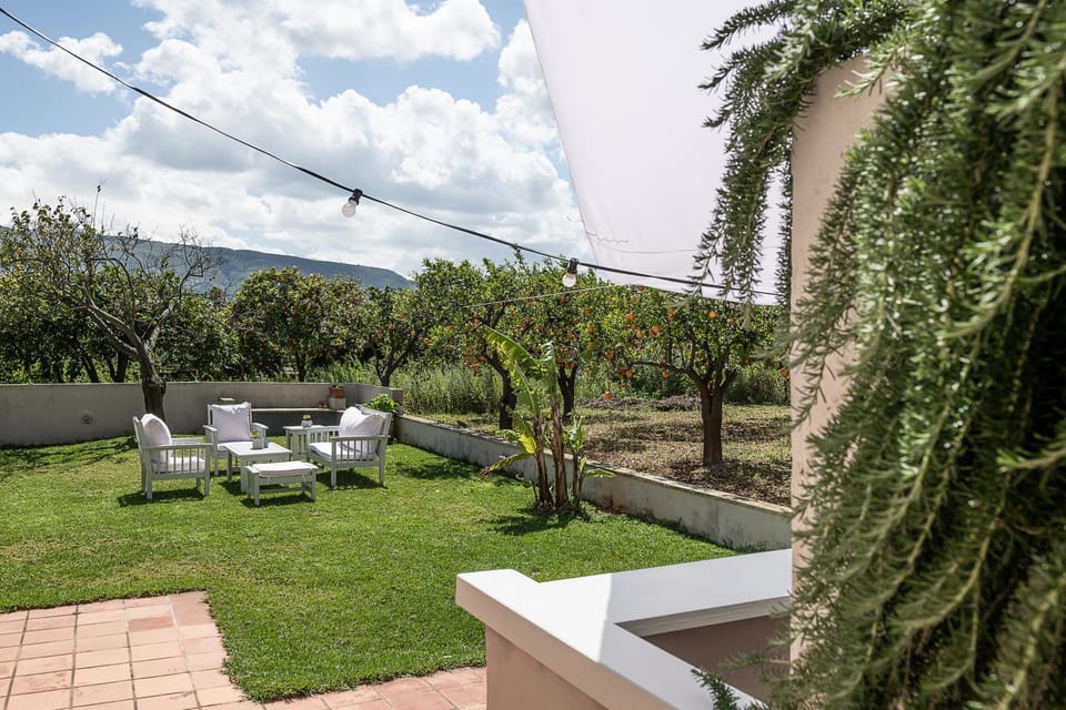 Property building, Day, Natural landscape, Garden, Seating area, Garden view, Mountain view, sunbed