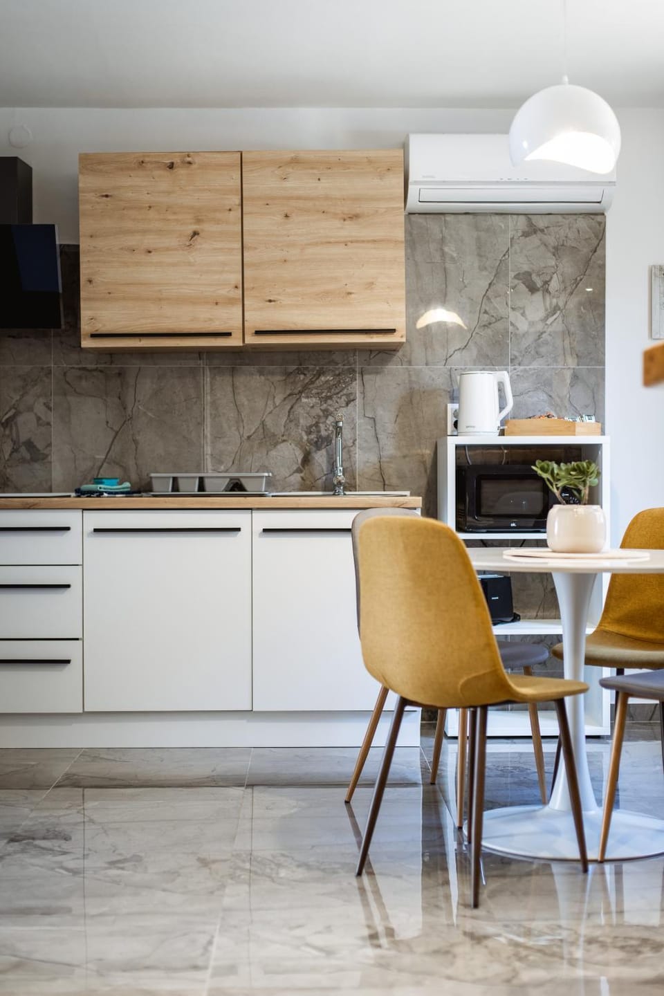 Kitchen or kitchenette, Dining area, dishwasher, stove, washing machine, washing machine
