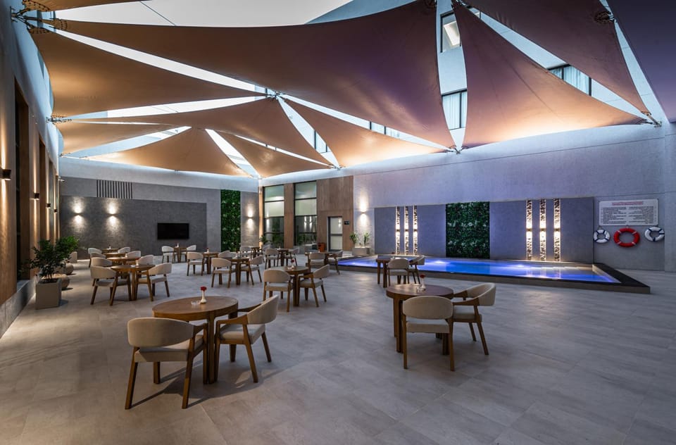 Property building, Restaurant/places to eat, Swimming pool