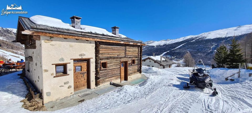 Mountain Chalet Scoiattolo by Livigno Accomodation Chalet in Canton of Grisons