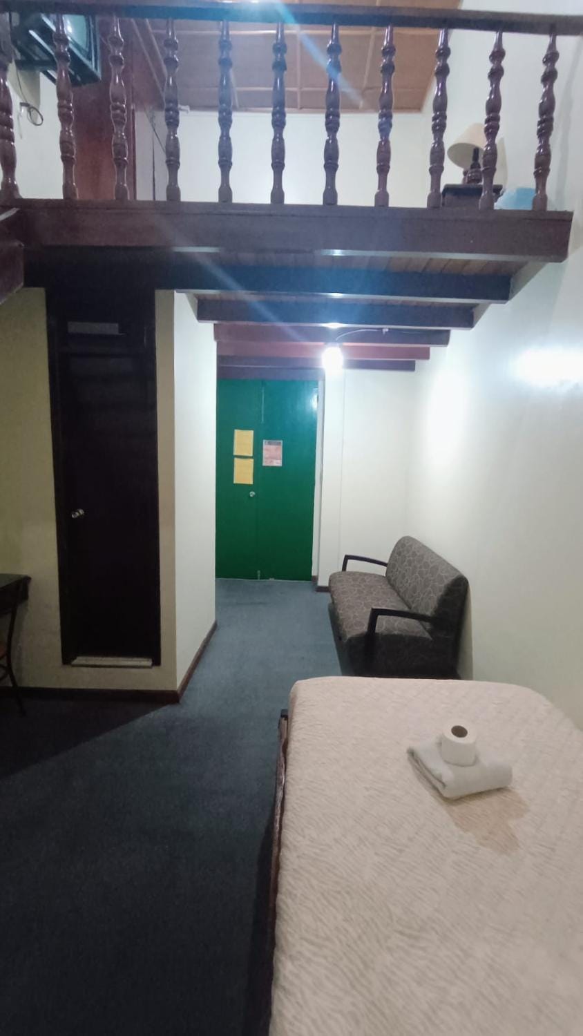 Bed, Seating area, Bedroom