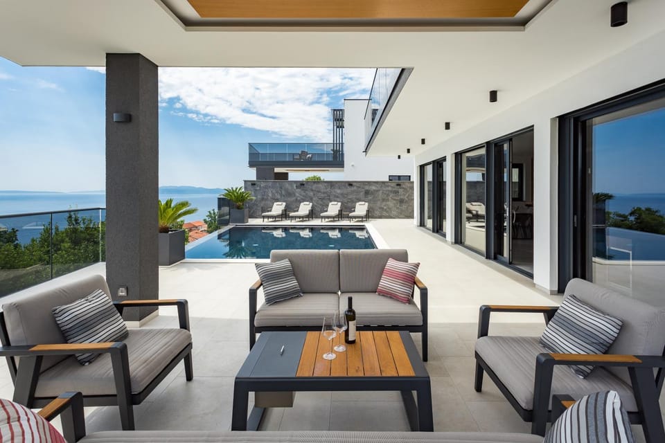 Patio, Day, Natural landscape, View (from property/room), Balcony/Terrace, Living room, Seating area, Pool view, Sea view, Swimming pool, sunbed