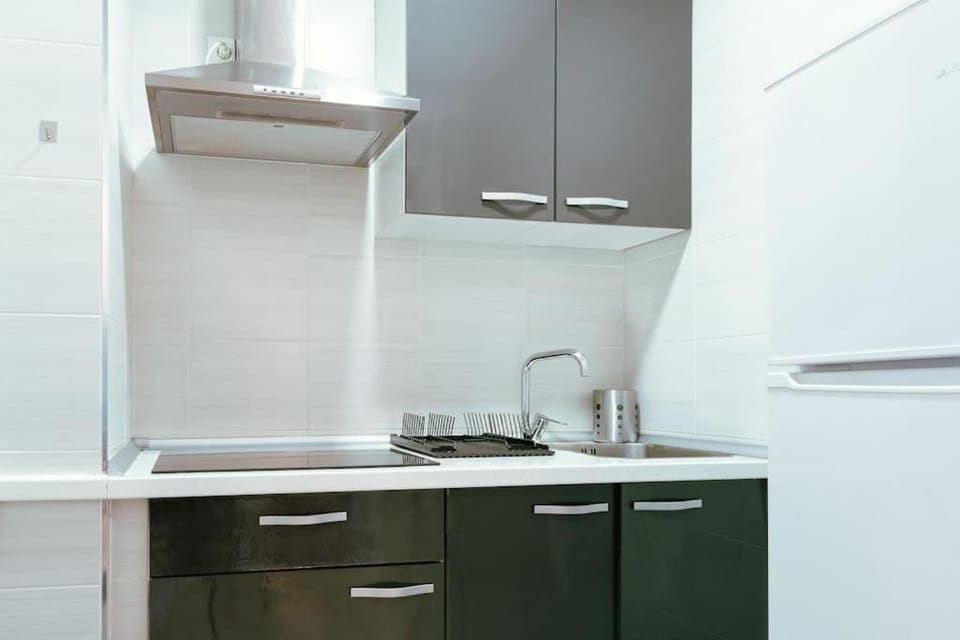 Kitchen or kitchenette, stove