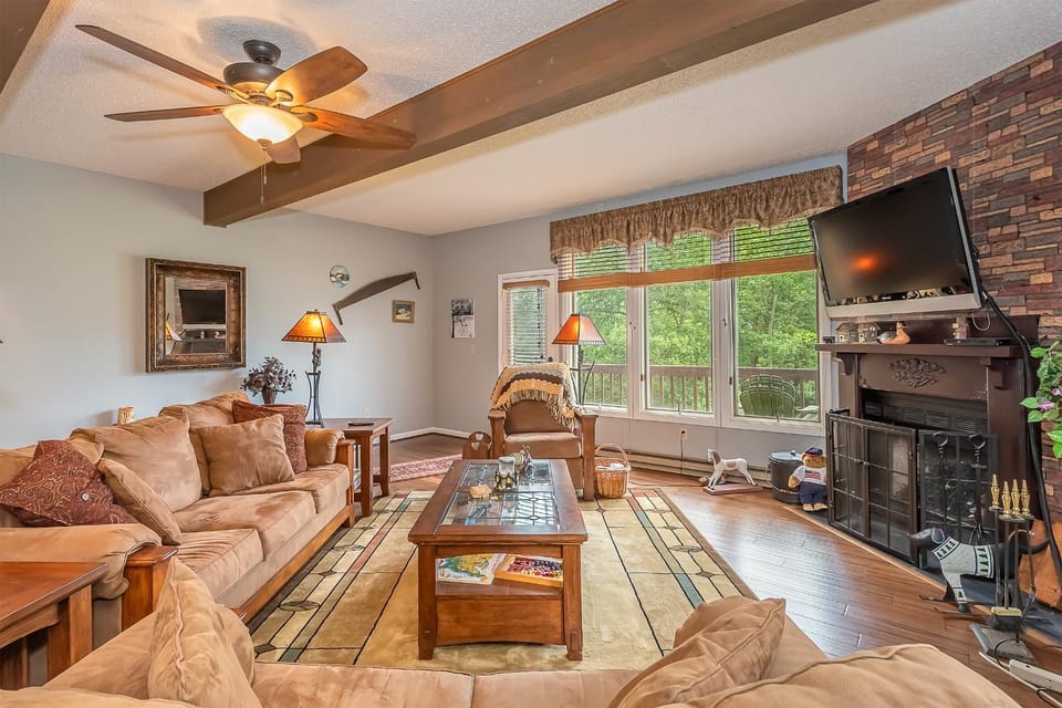 TV and multimedia, Balcony/Terrace, Living room, Seating area, Garden view, fireplace, furniture