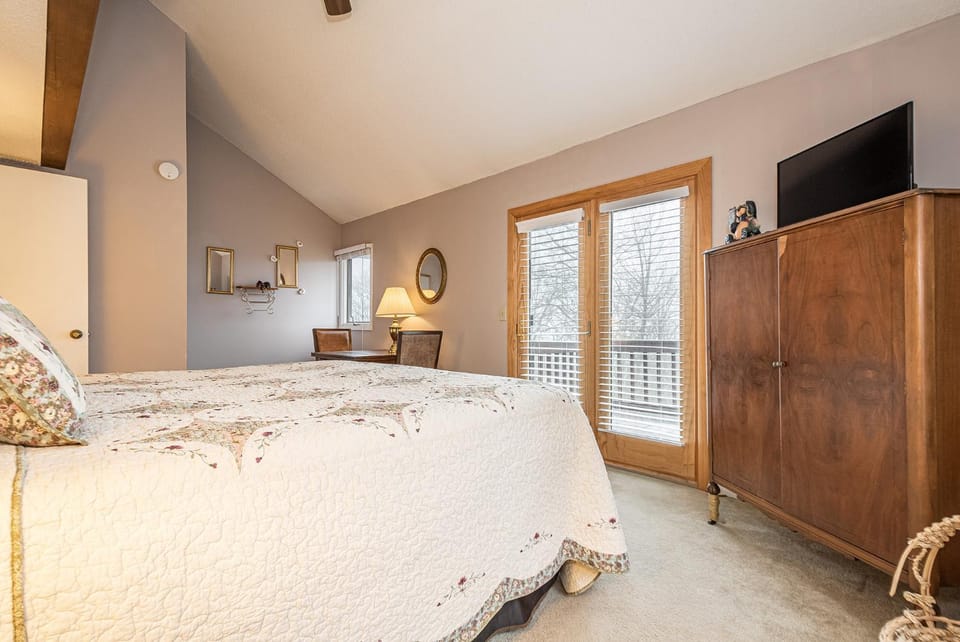 Bed, TV and multimedia, Bedroom, Garden view, furniture, wardrobe