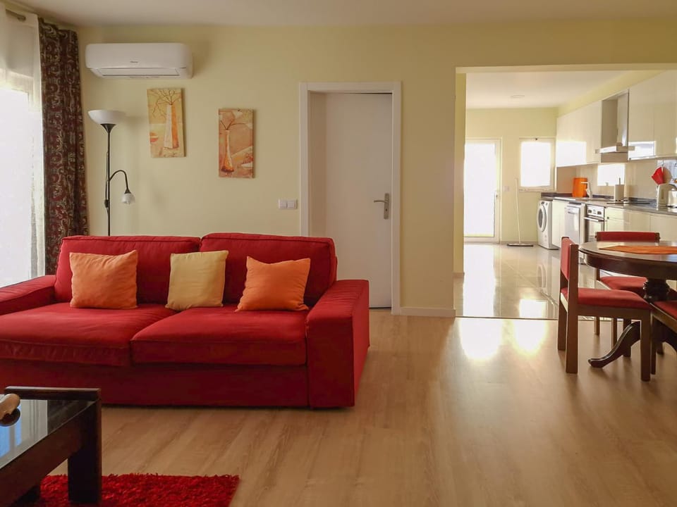 Kitchen or kitchenette, Living room, Seating area, air conditioner