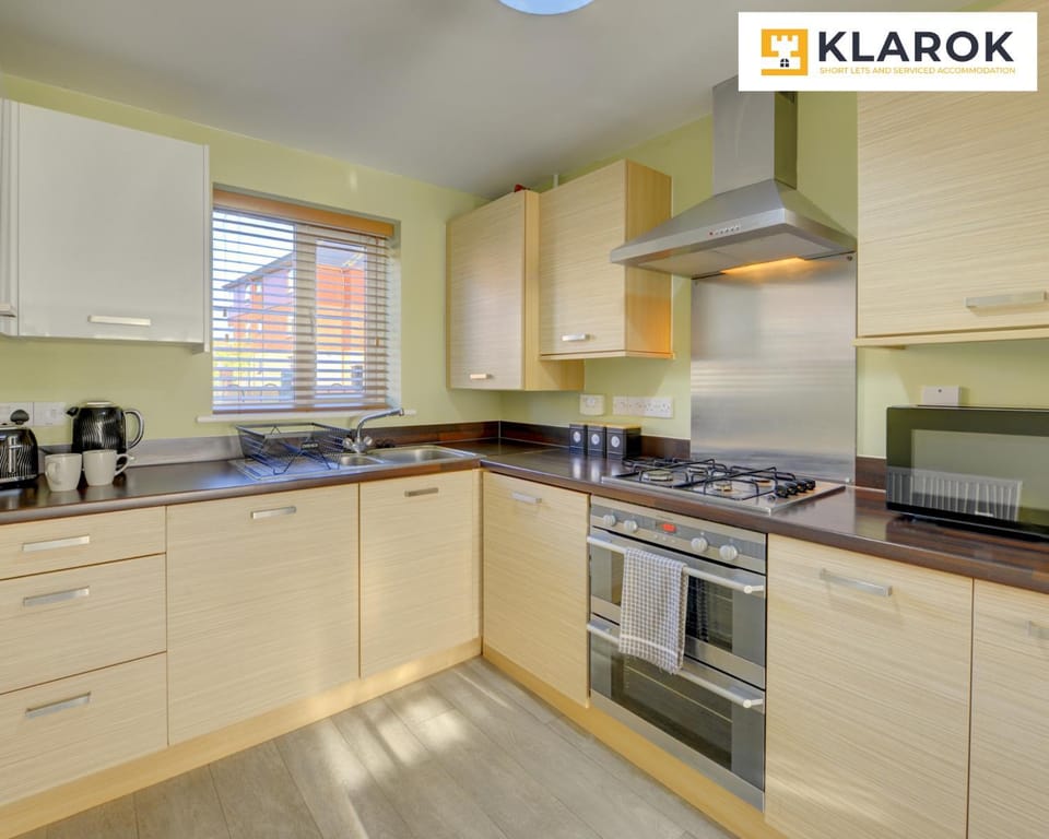 Kitchen or kitchenette, microwave, oven, stove, toaster, kitchen