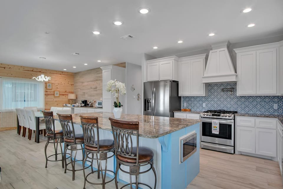 Kitchen or kitchenette, Living room, Seating area, Dining area, furniture, microwave, oven, stove, toaster