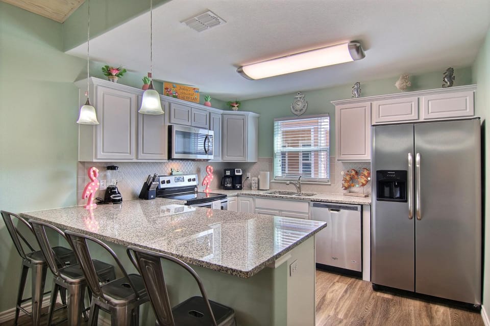 Kitchen or kitchenette, dishwasher, furniture, microwave, oven, stove, kitchen
