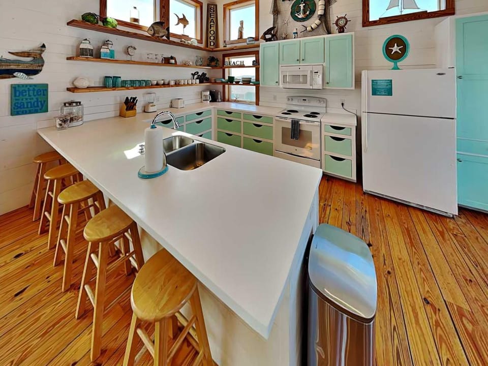 Kitchen or kitchenette, Seating area, furniture, microwave, oven, stove, kitchen