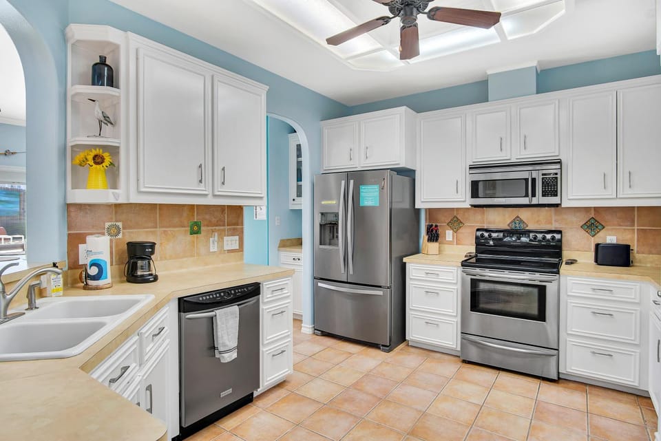 Kitchen or kitchenette, dishwasher, microwave, oven, stove, kitchen