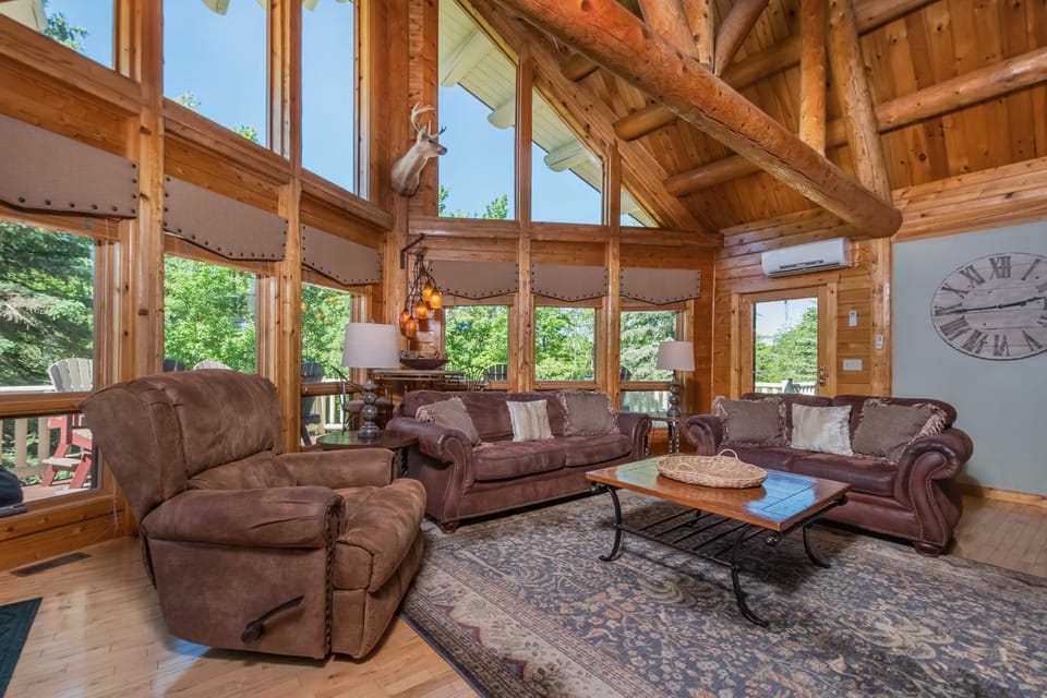 View (from property/room), Living room, Seating area, Garden view, furniture, air conditioner