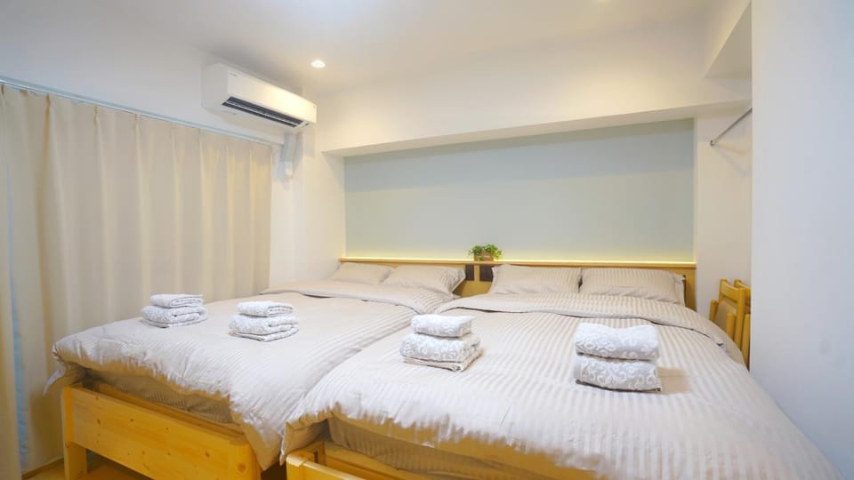 Bed, Photo of the whole room, Bedroom, towels, air conditioner