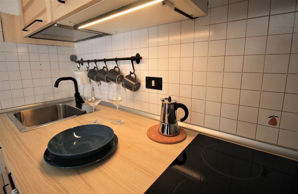 Kitchen or kitchenette, stove