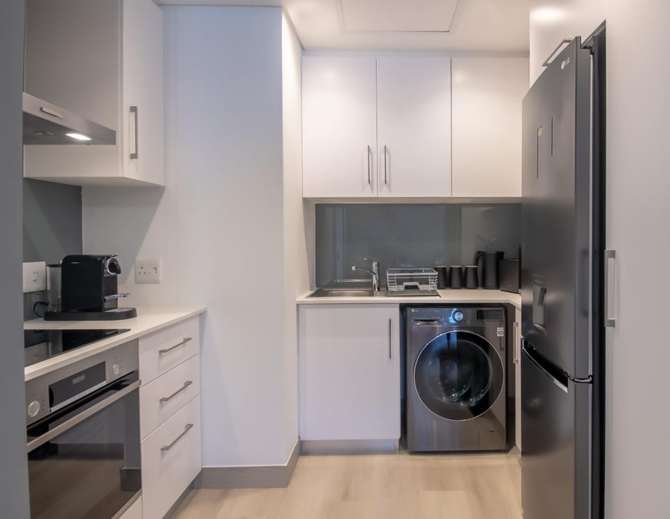 Kitchen or kitchenette, washing machine, dryer