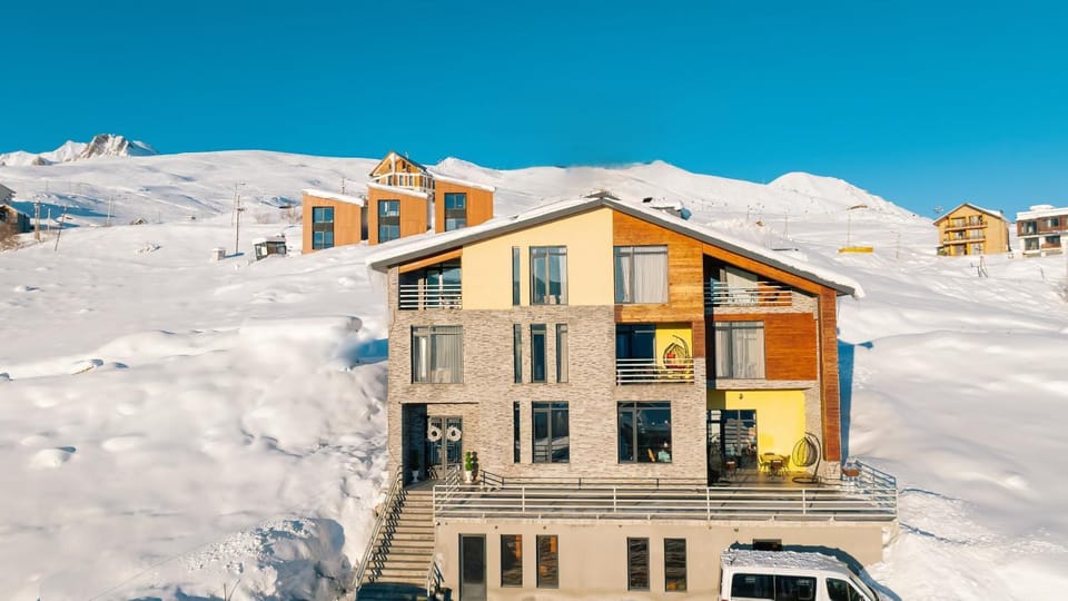 Property building, Nearby landmark, Day, Natural landscape, Winter, Mountain view