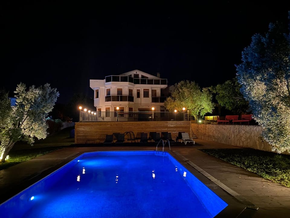 Property building, Night, Swimming pool