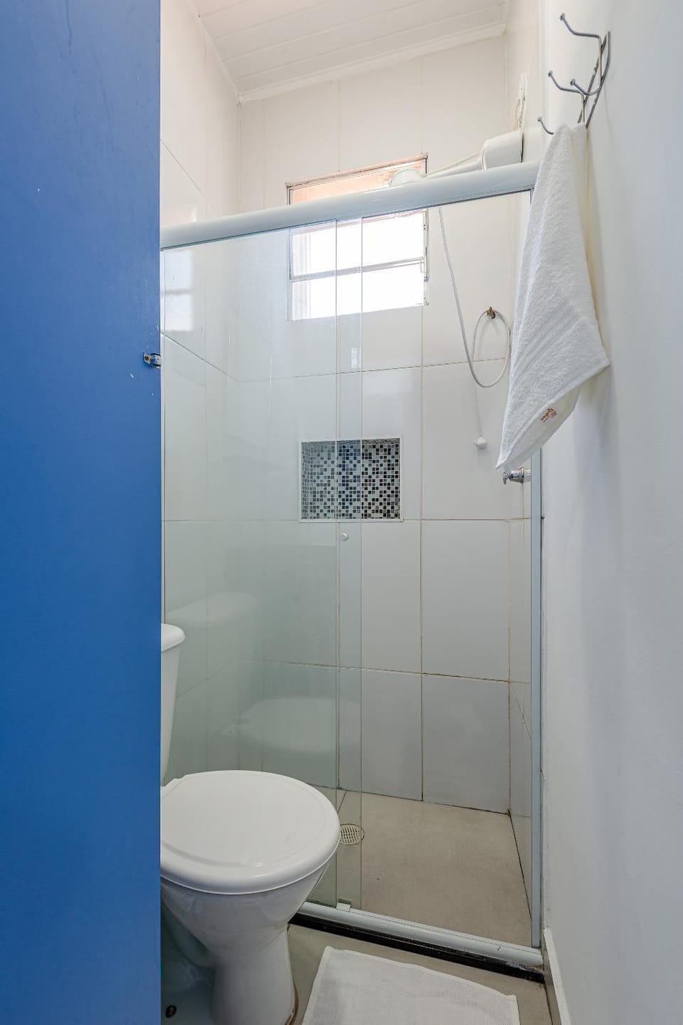 Shower, Toilet, Bathroom, hair dryier, towels