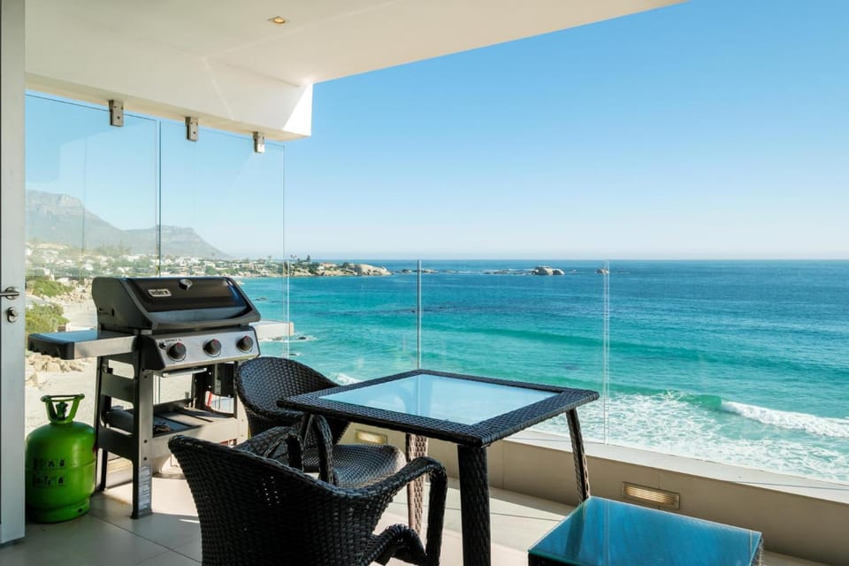 BBQ facilities, View (from property/room), Balcony/Terrace, Seating area, Dining area, Beach, Mountain view, Sea view