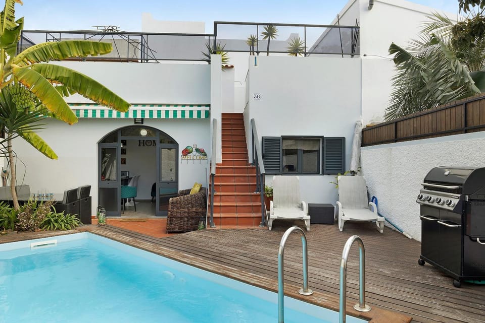 Property building, Living room, Swimming pool