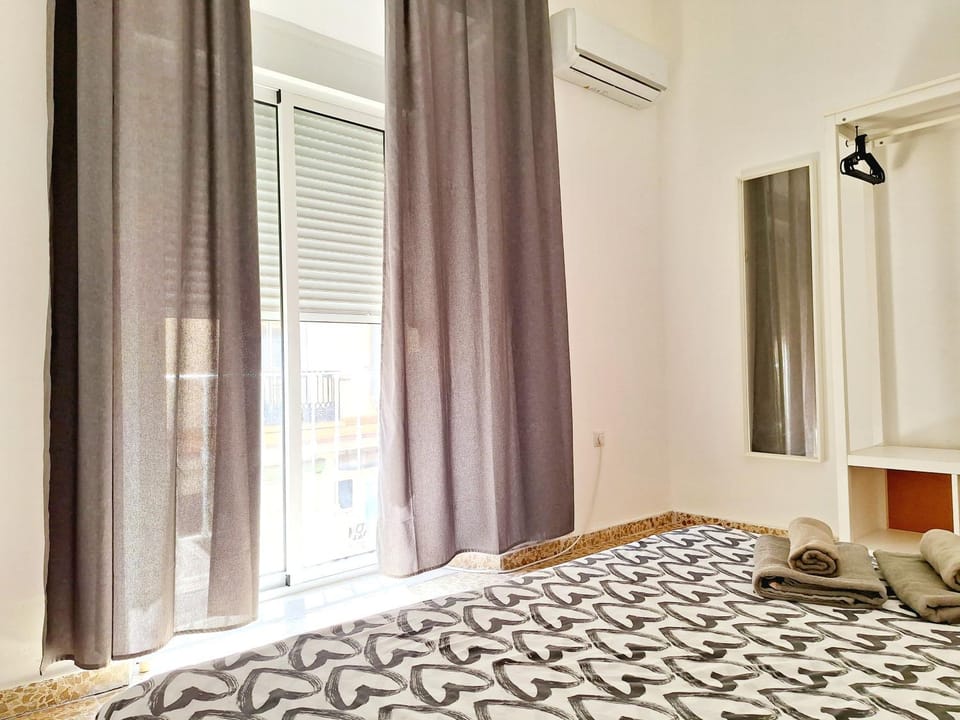Bed, Photo of the whole room, Bedroom, towels, air conditioner