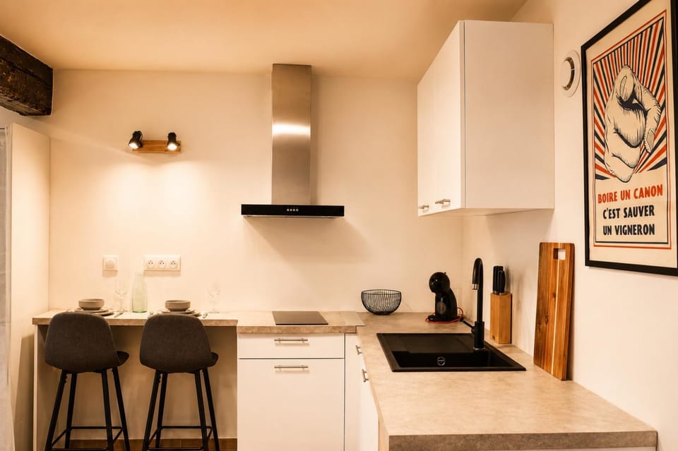 Kitchen or kitchenette, dishwasher, microwave, oven, stove