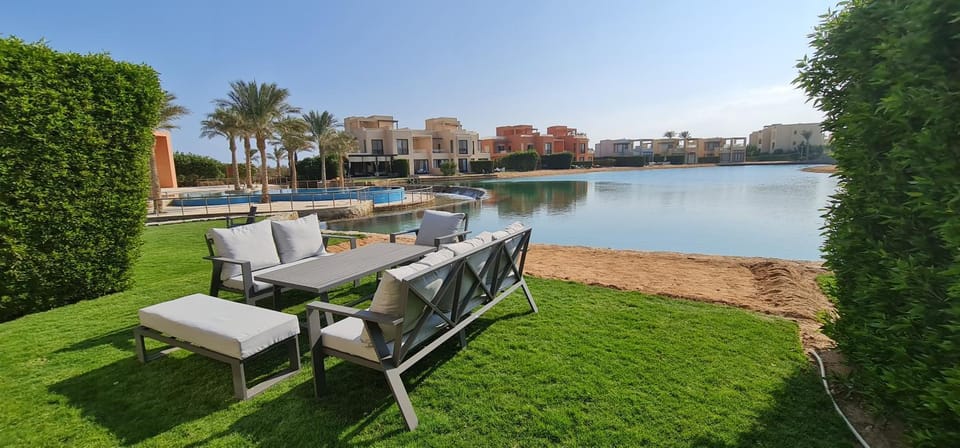 Natural landscape, Garden, Seating area, Garden view, Lake view, Pool view, Swimming pool