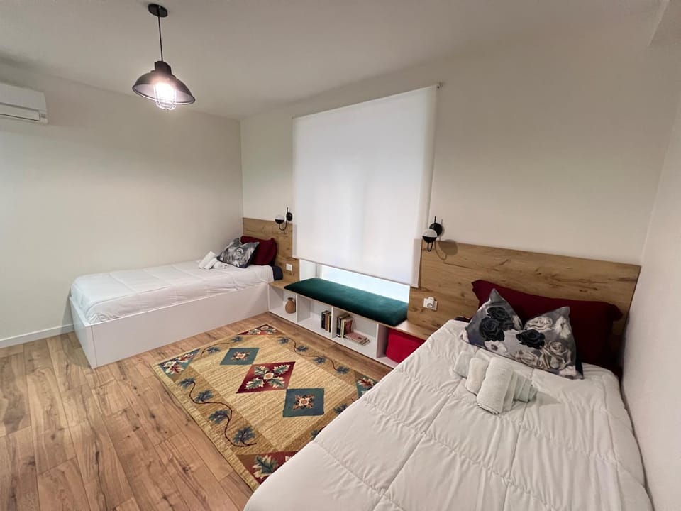 Bed, Photo of the whole room, Bedroom, towels, air conditioner