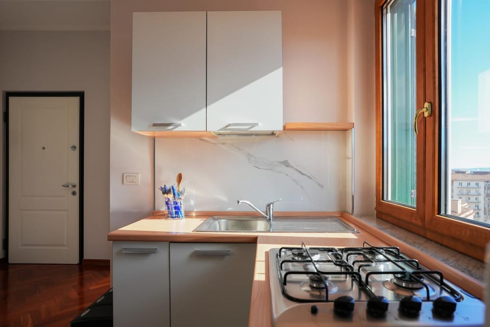 Kitchen or kitchenette, stove
