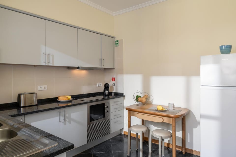 Kitchen or kitchenette, toaster