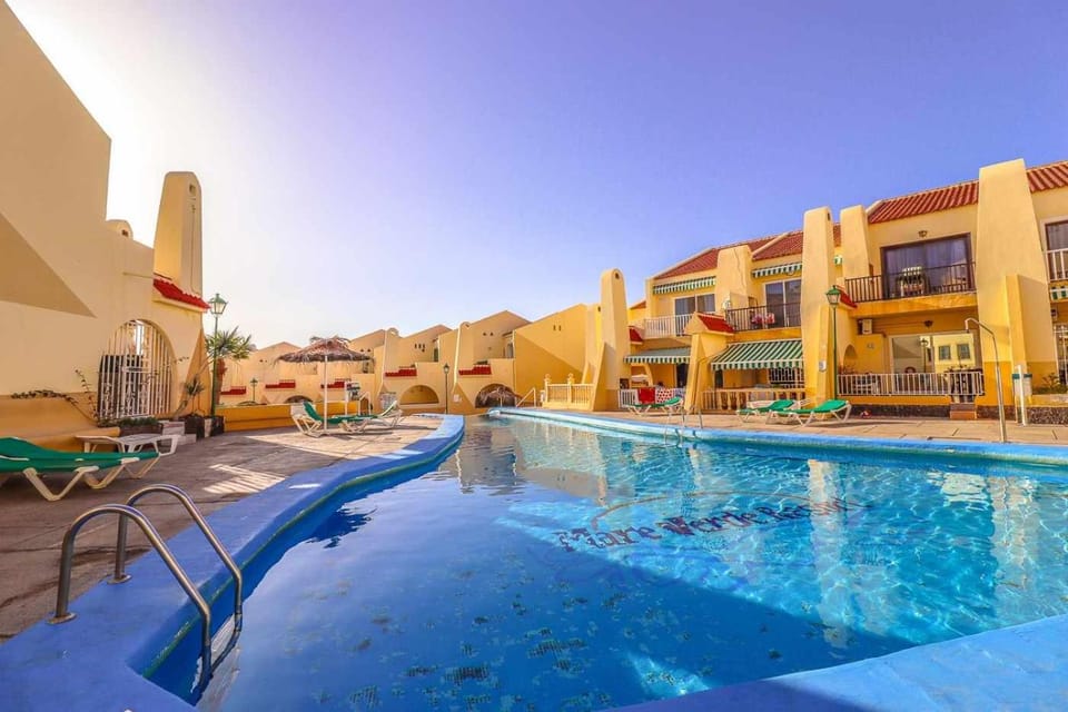 Property building, Pool view, Swimming pool, sunbed