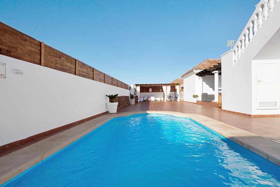 Property building, Living room, Swimming pool