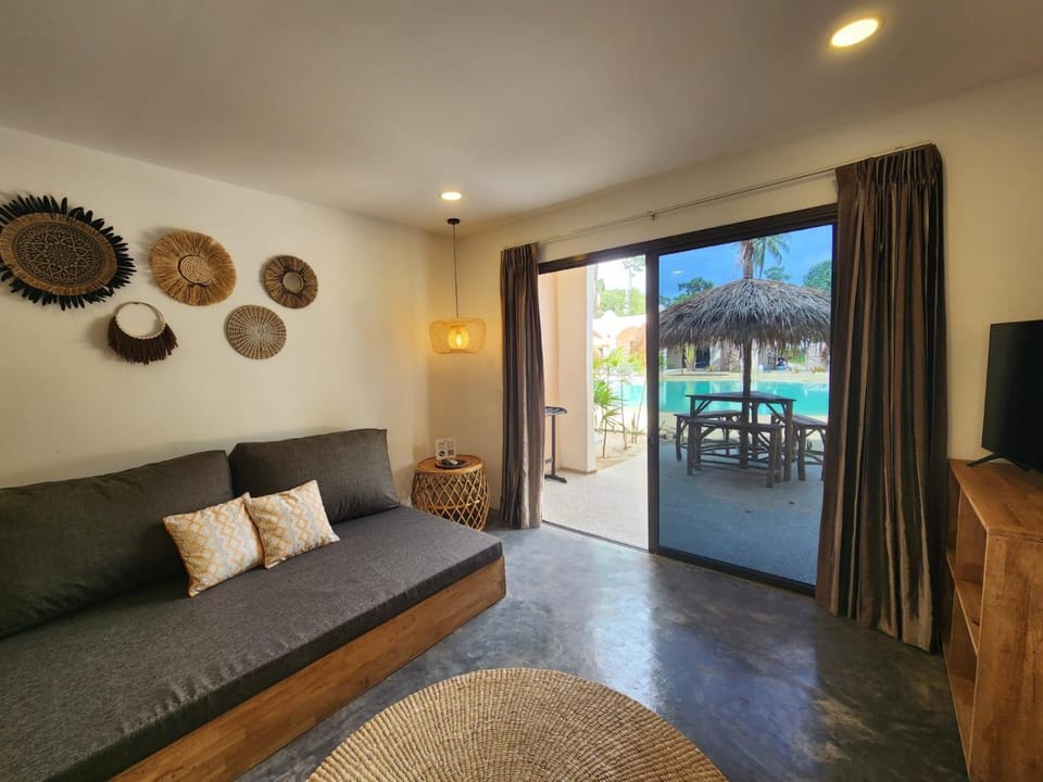 Patio, TV and multimedia, Living room, Seating area, Pool view