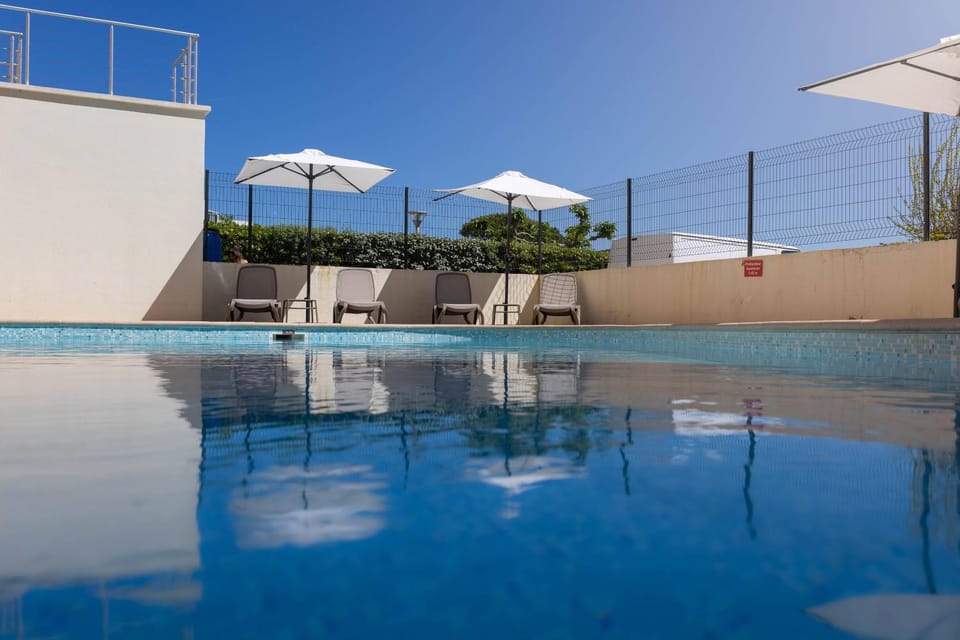 Day, Pool view, Swimming pool, sunbed