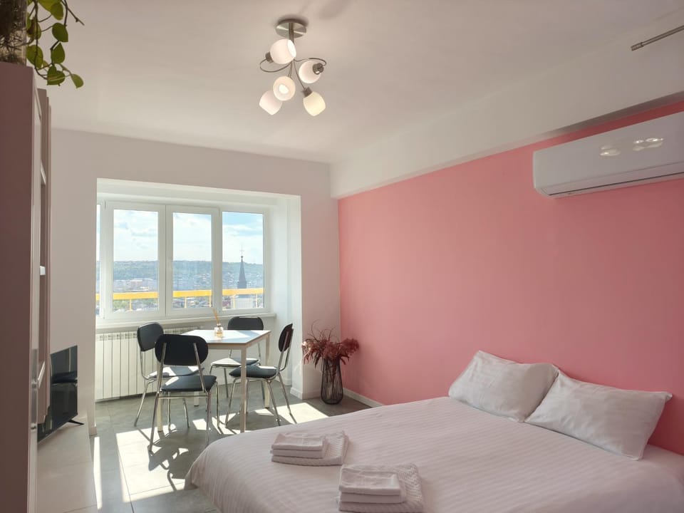 Bed, TV and multimedia, View (from property/room), View (from property/room), Living room, Dining area, Bedroom, City view, City view, towels, towels, air conditioner