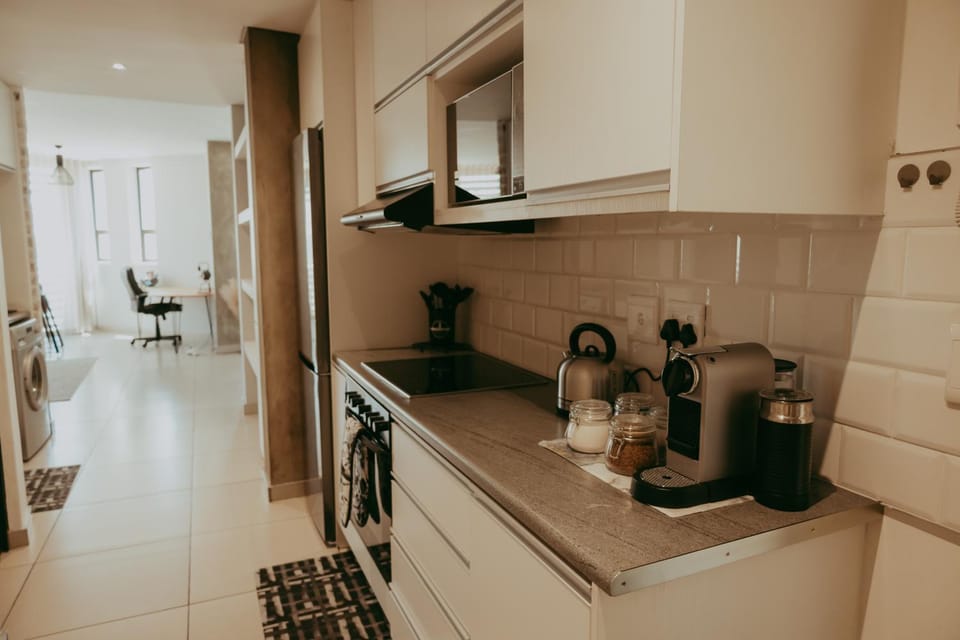 Kitchen or kitchenette, washing machine